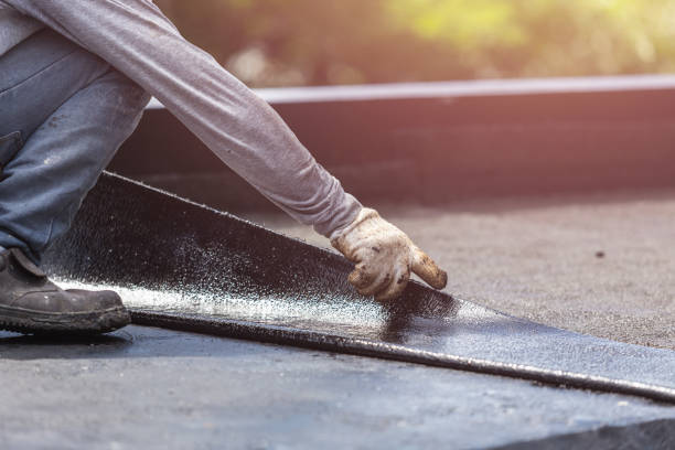 Professional Basement Waterproofing technician working in Coalton, OH